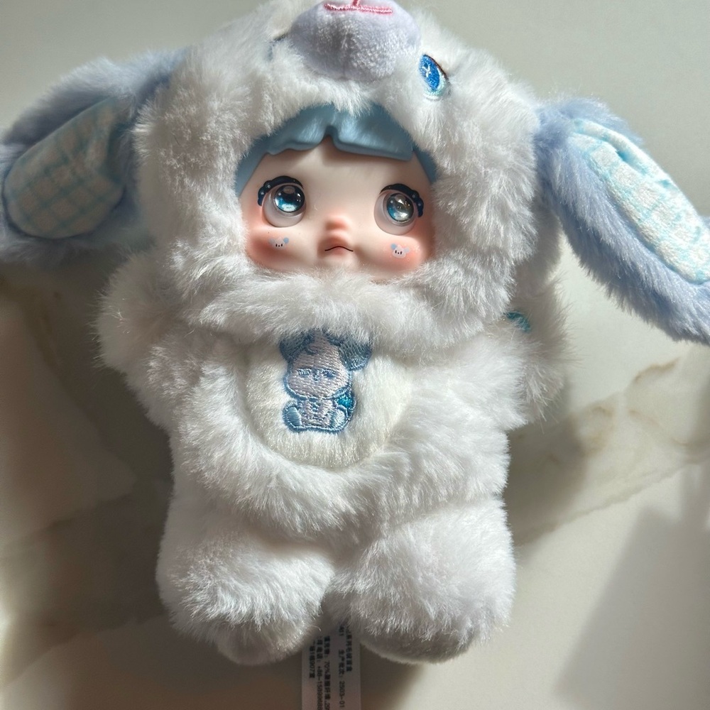 Nommi Adorable White and Blue Plush Doll